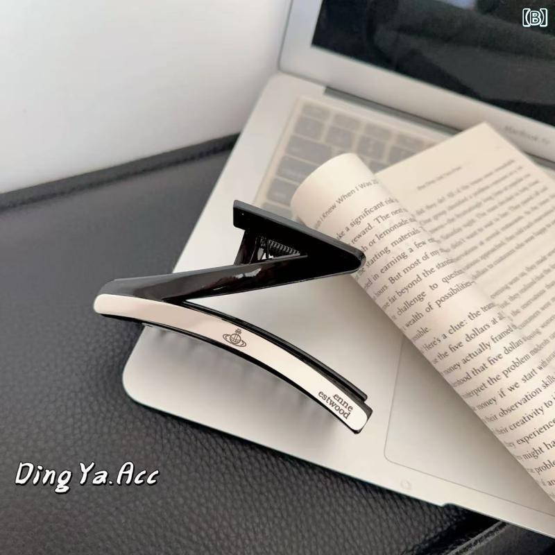 女性用 ヘアクリップ 高級感 Z字型 土星モチーフ 後頭部 アップヘア用 シャーククリップ ファッション スタイリッシュ 日常使い ヘアアクセサリー 髪まとめ 簡単固定の商品画像 3