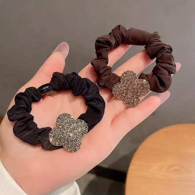樂天商城 - ヘアゴム 女性用 四つ葉 花 ラインストーン 装飾 シンプル 上品 高級感 ポニーテール お団子ヘア 伸縮性 ゴム 日常使い ヘアアクセサリー