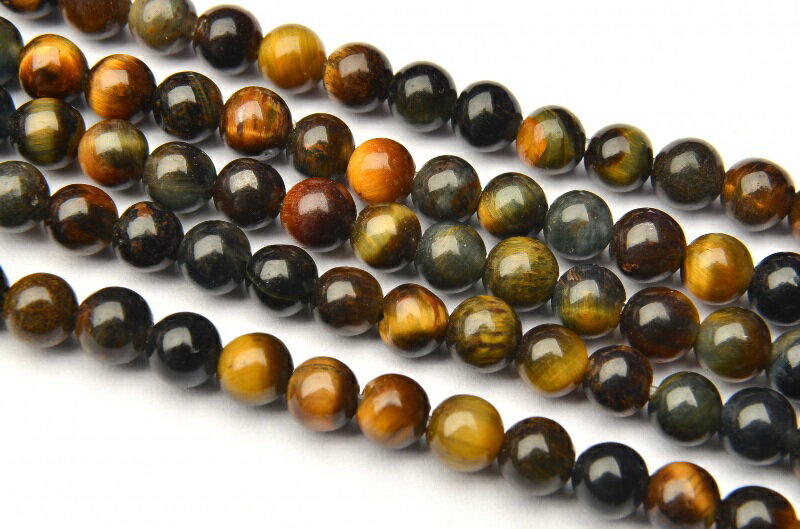 材質イエロー・ブルータイガーアイ 4mmサイズ約4mm（±0.5mm）特徴・意味タイガーアイの日本名は『虎眼石』。その名称は、光の反射によって虎の眼のようなシャトヤンシー効果がみられることに由来しています。金運や仕事運を高め、願望の達成をサポートしてくれる石として高い人気を誇るタイガーアイ。光の反射によって縞模様が虎の眼のように見えることか ら、古くより虎の眼のごとく『すべてを見通す眼』と考えられてきました。その『眼』のパワーは洞察力を高め、物事の本質を見抜き、災厄を退け、成功をもた らすといわれています。こちらの商品について■天然石のため、細かい欠けや凹み、クラックなどがある場合がございます。また、在庫よりランダムに選出するため、商品により多少のサイズ誤差、お色味に個体差がございます。■出来る限り商品現物に近いお色味になるよう撮影を心がけておりますが、お使いのディスプレイ環境によってお色味が異なって表示されることがございます。あらかじめご了承下さい。