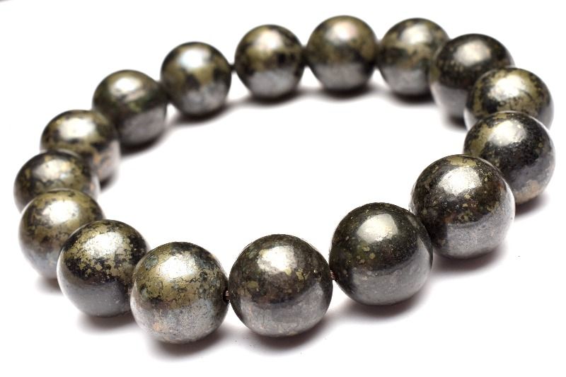 材質ヒーラーズゴールド 12-12.5mm 産地：コロンビアサイズ約12-12.5mm(±0.5mm)腕周り約15cm(伸縮性あり)重さ約60g特徴・意味パイライトとマグネタイトの組み合わさった石で、アメリカの南西部で発見されたヒーラーズス...