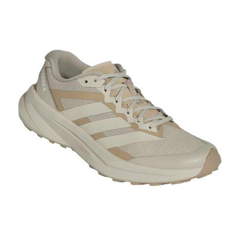 ●メーカーカラー表記:Wonder Beige/Beige/Trace Khaki●レギュラー 2E相当●ニュートラル●トレイルラン オフロードを走りたい方向け●クッション◎●レギュラーフィット●シューレース●テキスタイルと合成素材のアッパー●テキスタイルソックライナー●ラバーアウトソール●LIGHTSTRIKEテクノロジー●ダイナミックなトレイルランニング向けにLightstrikeクッショニングを採用したシューズ。●冒険に旅立つ人のための高機能シューズが、このテレックス アグラヴィック LT W。トレイルランニング愛好家の間で品質と革新性に定評があるテレックスラインの一つで、起伏の多い地形でも自信を持って走ることができる。●Lightstrikeテクノロジーにより優れたクッション性を実現しているため、急な坂道や岩だらけの道でもペースと快適さをキープ。●耐久性と通気性に優れたテキスタイルと合成素材のアッパーは、足を涼しく保ちつつ、しっかり保護。また、ラバーアウトソールはさまざまなサーフェスで確かなグリップ力と安定性を発揮。滑ることを心配せずにランニングに集中できる。●さらに、優れたフィット感のレースクロージャーで、足の形に合わせて快適な履き心地を実現している。【商品の購入にあたっての注意事項】【こちらの商品について】※シューズの製造過程で、接着剤の付着や縫製のズレ・歪みを生じている場合がありますが、使用上問題無いと判断したものを販売しております。あらかじめご了承のうえ、お買い求めください。※靴ひもの長さについては、左右10cm以内の差までは弊社許容内とさせていただいております。左右の紐に10cm以上の差がある場合はメールにてお問い合わせください。※一部商品において弊社カラー表記がメーカーカラー表記と異なる場合があります。※ブラウザやお使いのモニター環境により、掲載画像と実際の商品の色味が若干異なる場合があります。※掲載の価格・製品のパッケージ・デザイン・仕様について、予告なく変更することがあります。あらかじめご了承ください。2026年春夏モデル 2026ssmodel アディダス ADIDAS スーパースポーツゼビオ ゼビオ Super Sports XEBIO トレーニングシューズ 靴 トレイルシューズ Lady's Ladys レディース れでぃーす 女性 マラソン ランニング トレイル トレラン ランシュー トレシュー ランナー レース スポーツシューズ スニーカー 運動靴 オフロード クッション性 長距離 快適 履き心地 耐久性 アウトドア 通気性 ドライ 厚底 ラバーアウトソール グリップ力 安定性 フィット感 オフホワイト adi2605pt10 adi2605cpn20 adi2605cpn20pt10 2607adi_mpc