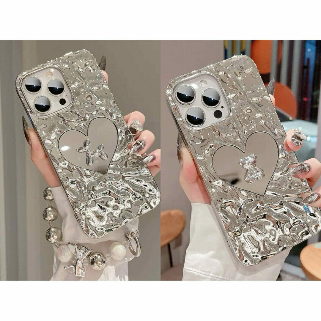 商品説明高級感溢れるメタリックデザインと立体アクセントが魅力のiPhoneケース ?光沢感のあるメタリック仕上げに、ハート型のミラーアクセントを組み合わせたラグジュアリーなデザイン。さらに、中央には立体的なバルーンアニマルやベアの装飾が施さ...
