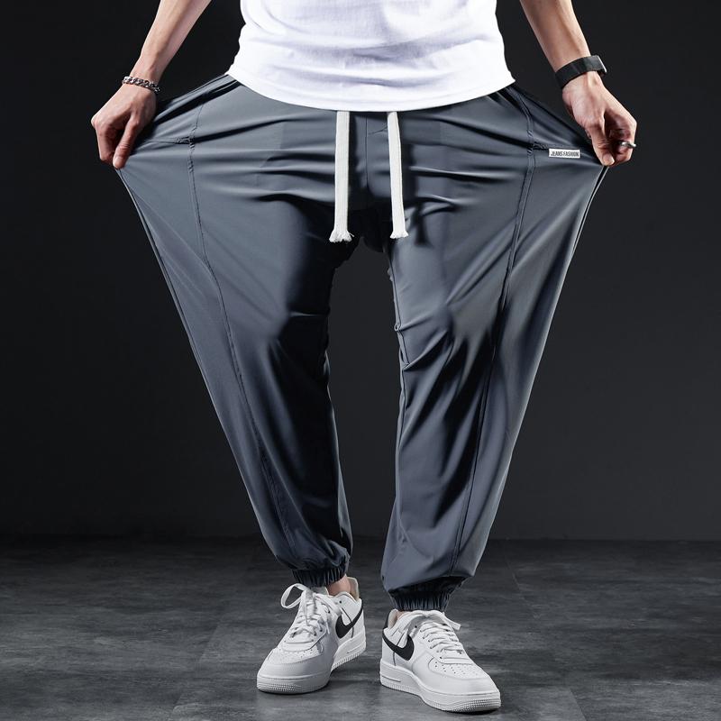 Rakuten - メンズ ファッション 服 男性用 オシャレ シンプル 大人 かっこいい ストリート スポーツ パンツ ズボン 履物 ゆったり 伸縮性 ストレッチ ストレッチ 袖口 速乾 スウェット