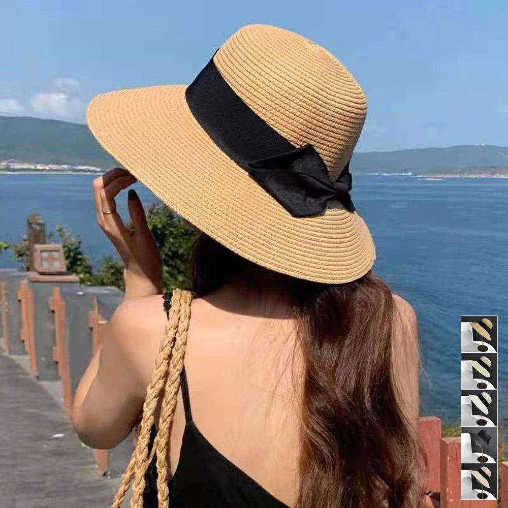 麦わら帽子 ストローハットリボン付き夏帽子ナチュラル ハット サマー ぼうし夏海 韓国風可愛い帽 レディース 紫外線UV対策帽子 つば広 ビーチ帽子 春夏 日よけ帽子 折りたたみ UVケア リゾートハット アウトドア ビッグリボン付きのナチュラル麦わら帽子ツバが長いので、しっかり紫外線対策ができる折りたたんでコンパクトになって持ち運びに便利普段使いはもちろん、デートや旅行などいろいろな場面で活躍できる素材:分類外繊維(ペーパー)+ポリエステルカラー：ベージュ/ブラック/キャメル/アイボリー/薄ピンク頭囲：約56-58cm(調節可能)深さ：約11cmつば：約10cm裏地：なし伸縮性：なし生産国：中国※すべて平置きサイズです（採寸方法違いより、多少の誤差がございますので、ご了承ください）。※海外輸入品のため、商品の細部仕様は多少異なる場合がございます。予めご了承の上、ご注文お願い致します。◎ 複数店舗で在庫を共有しているため、ご注文のタイミングにより 急遽在庫欠品となる場合がございますので、予めご了承ください。 5麦わら帽子 ストローハットリボン付き夏帽子ナチュラル ハット サマー ぼうし夏海 韓国風可愛い帽 レディース 紫外線UV対策帽子 つば広 ビーチ帽子 春夏 日よけ帽子 折りたたみ UVケア リゾートハット アウトドア ビッグリボン付きのナチュラル麦わら帽子ツバが長いので、しっかり紫外線対策ができる折りたたんでコンパクトになって持ち運びに便利普段使いはもちろん、デートや旅行などいろいろな場面で活躍できる素材:分類外繊維(ペーパー)+ポリエステルカラー：ベージュ/ブラック/キャメル/アイボリー/薄ピンク頭囲：約56-58cm(調節可能)深さ：約11cmつば：約10cm裏地：なし伸縮性：なし生産国：中国※すべて平置きサイズです（採寸方法違いより、多少の誤差がございますので、ご了承ください）。※海外輸入品のため、商品の細部仕様は多少異なる場合がございます。予めご了承の上、ご注文お願い致します。◎ 複数店舗で在庫を共有しているため、ご注文のタイミングにより 急遽在庫欠品となる場合がございますので、予めご了承ください。 5