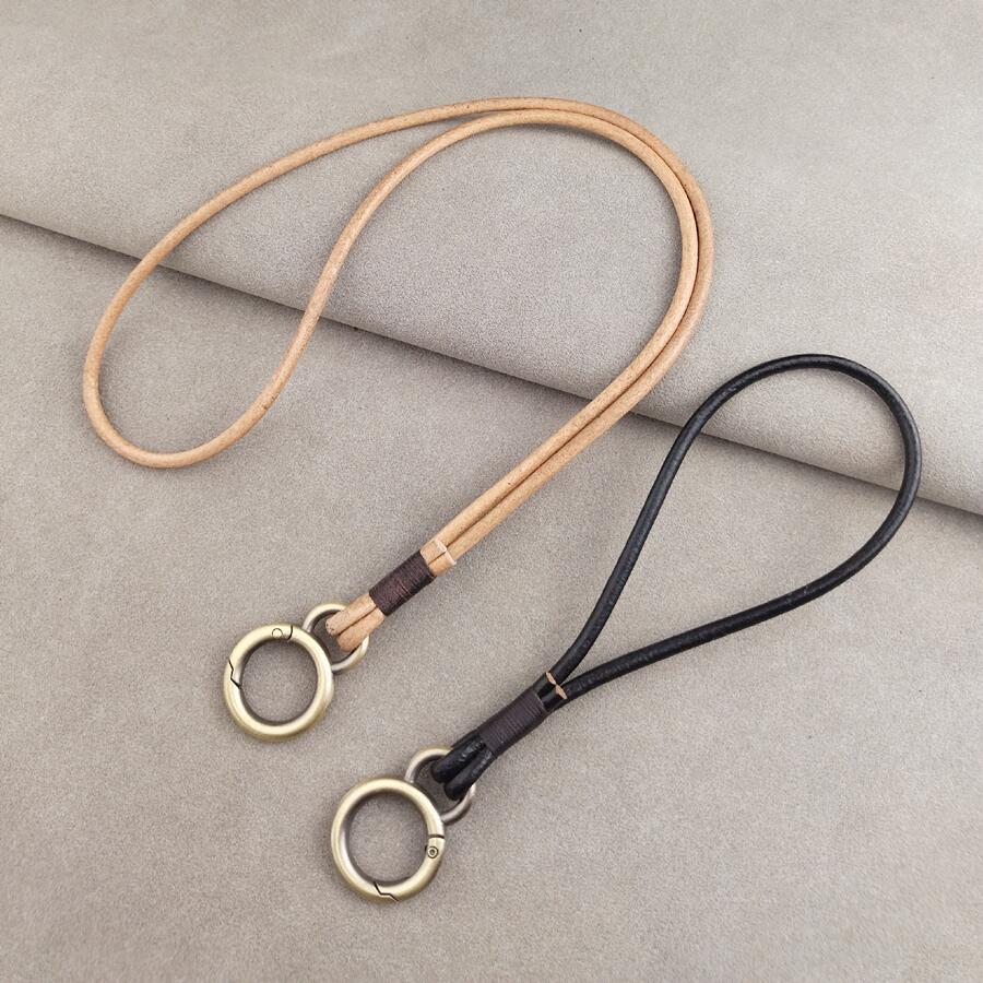 【15%OFFクーポン配布中！】牛革 ロープ キーホルダー 投げ防止首掛けロープ 手編み 本革 手首掛けバックル携帯 ストラップ