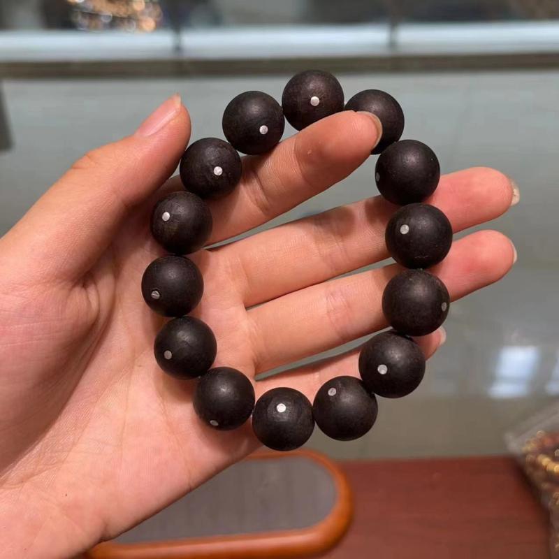 新しい 黒檀 銀 釘の ブレスレットの 手 串の 古い 材料の 男女の 金の 沈香 木 diy 文は ブレスレットの 沈香 仏 珠を 遊びます。
