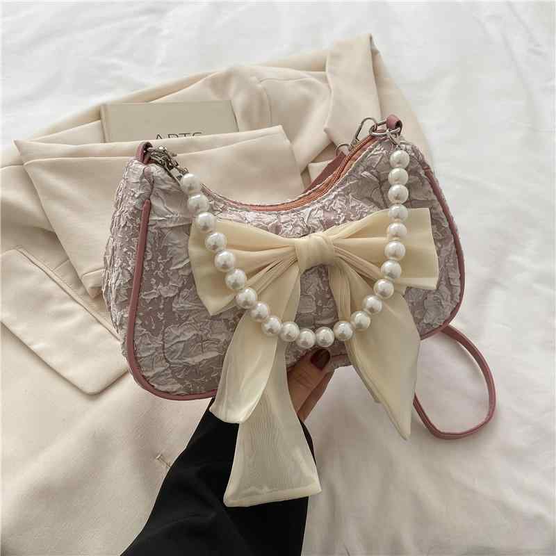 Pochettes - ミニバッグ レディース 春夏 かわいい 蝶結び 珍珠 装飾 斜めがけ ショルダーバッグ ハンドバッグ 小型 横型 方形 合成皮革 プルックデザイン 街頭ファッション トレンド スタイル 軽量 コンパクト サイズ ピンク 系 ブラック ホワイト アイボリー