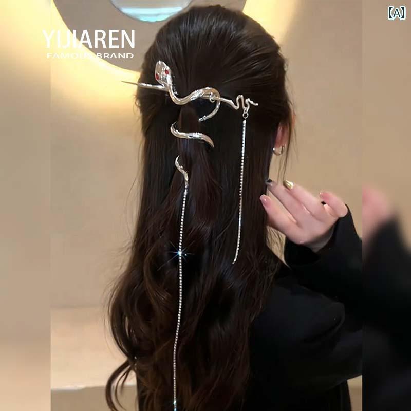 巻きつき蛇の形のヘアピンタッセル付き中華風の豪華感が金属製ヘアピンシックのポニーテール用ヘアアクセサリー