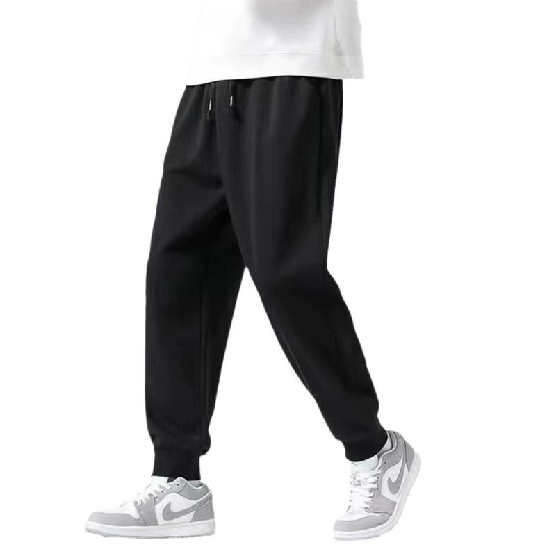 スウェットパンツ メンズ 男性用 秋冬 裏起毛 暖かい 大きいサイズ ゆったり スポーツ ウェア 部屋着 リラックスパンツ 9分丈 伸縮性 ブラック グレー・カテゴリ: カジュアルパンツ・スタイル: スポーティ・対象: メンズ・サイズ: M, L, XL, XXL, 3XL, 4XL, 5XL・カラー: ブラック（裏起毛）, ライトグレー（裏起毛）, ブラック（薄手）・柄: 無地・パンツ丈: 9分丈・股上: ハイウエスト・素材: ポリエステル95%・生地: ストレッチ・特徴: 洗濯機洗い可, 摩耗性, 高さ色落ち耐性・フィット: ルーズ・裾: 絞り・厚さ: 厚手（裏起毛）・伸縮性: ややあり
