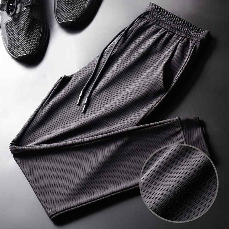 パンツ メンズ スポーツ ウェア 接触冷感 薄手 イージーパンツ 9分丈 ロングパンツ 伸縮性 ポリエステル 部屋着 ルームウェア 普段使い 黒 ブラック グレー・カテゴリ: カジュアルパンツ・スタイル: カジュアル・対象: 青少年.成人・デザイン: 無地・パンツタイプ: 鉛筆パンツ.スキニーパンツ・パンツシルエット: ルーズ・パンツ丈: フルレングス・ウエスト: ミドルウエスト・ベルト: 有り・フロント: ひも・厚さ: 薄手・素材: ポリエステル・素材構成: ポリエステル60%・特徴: ストレッチ.イージーケア・裾: 絞り・色: ブラック.ライトグレー・サイズ: M.L.XL.2XL.3XL.4XL.5XL・性別: 男性