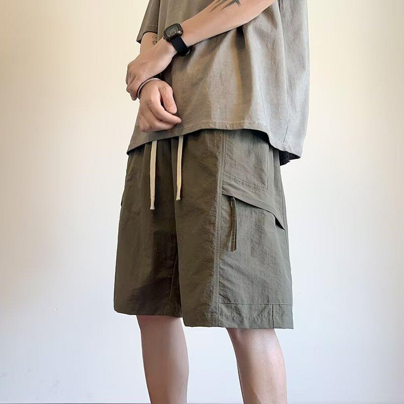 ハーフパンツ メンズ カーゴパンツ 薄手 接触冷感 無地 ミリタリー ワークパンツ ショートパンツ ルーズ ストレート イージーパンツ カーキ ブラック グリーン・カテゴリ: カジュアルパンツ・スタイル: アメカジ・パンツのタイプ: ワークパンツ・パンツの長さ: ハーフパンツ・ウエスト: ミドルウエスト・ベルト: あり・前立て: 紐・厚さ: 薄手・柄: 無地・素材: 化繊混紡・メイン素材: タスロンアイス・メイン素材の含有量: 95.5%・対象年齢: 18-24歳・対象: メンズ・シーン: 日常・裾: ストレート・ディテール: 多ポケット・ストレッチ: なし・色: ブラック, グリーン, カーキ・サイズ: M, L, XL, 2XL, 3XL・製品タイプ: カジュアルパンツ
