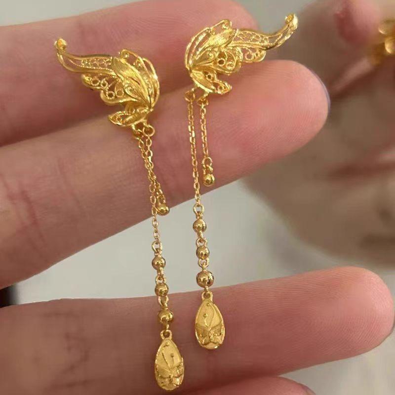 イヤリング ピアス レトロ 蝶 モチーフ 金メッキ 透かし ファッション 普段使い 高級感 デイリー 軽量・カテゴリ: イヤリング・スタイル: エスニック.アーティスティック・レトロ・主な素材: 銅・: 蝶結.幾何学模様・要素: 蝶.動物・...