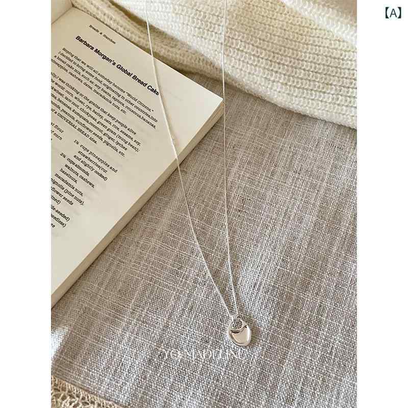 ネックレス レディース シルバー ロングペンダント 鞍型バッグ風 秋冬 軽奢 高級感 レトロ 首掛け セー..