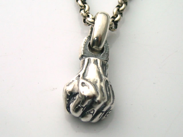 Fist pendant top with tattoo 