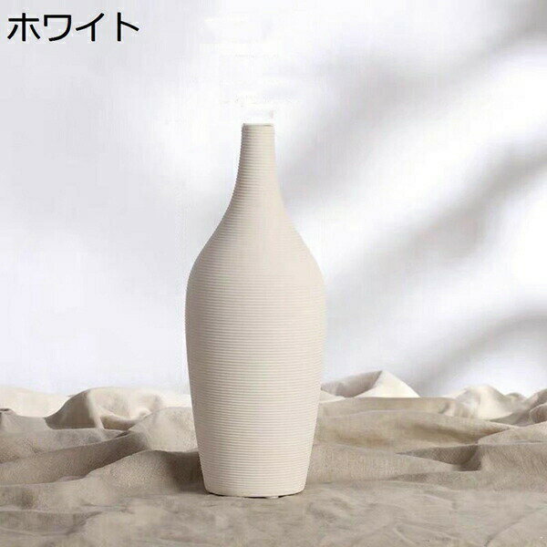 　　　 ◆◇◆人気の秘密◆◇◆ 素材：セラミック 滑らかな入り口：瓶の入り口は研磨処理を経て、丸く滑らかで手を傷つけない。 滑り止めな瓶の底：瓶の底は微々凹み、?放は更にしっかりしていて、生け花は倒れにくい。 適用シーン：ティーテーブル、オフィス、テーブル、ベッドサイドなど。 プレゼント用：記念日、誕生日、お祝い日の場合にご家族、お友達、先輩、彼女への素敵なギフトとしてお勧めます。 　　　◆◇◆注意事項◆◇◆ご覧のモニターの環境、撮影環境により実物と色味が異なって見える場合がございます。湿った状態で他のものと擦り合わせると色が移る恐れがあります。濃色品の洗濯時は、白色、淡色と分けて洗ってください。説明 【材質&メンテナンス】▼花瓶は易損品のですから、取り扱いに注意してください。▼セラミック容器は製造技術の問題により軽微な痕、発泡、水波紋などの状況が発生し、これは正常な現象です。使用や美観に影響しなく、予めご了承ください。▼スクラッチによる細菌の増殖を防ぐために、鉄ブラシで洗わなく、中性洗剤での洗浄をおすすめします。▼製品の耐熱温度は70℃を超えず、セラミックの破裂を避けます。▼花瓶が落ちて破片に傷つけられないように、6歳以下の子供を花瓶に近づけて遊ばせないでください。▼手動測定には若干の誤差があり、具体的な寸法は実物に準ずます。