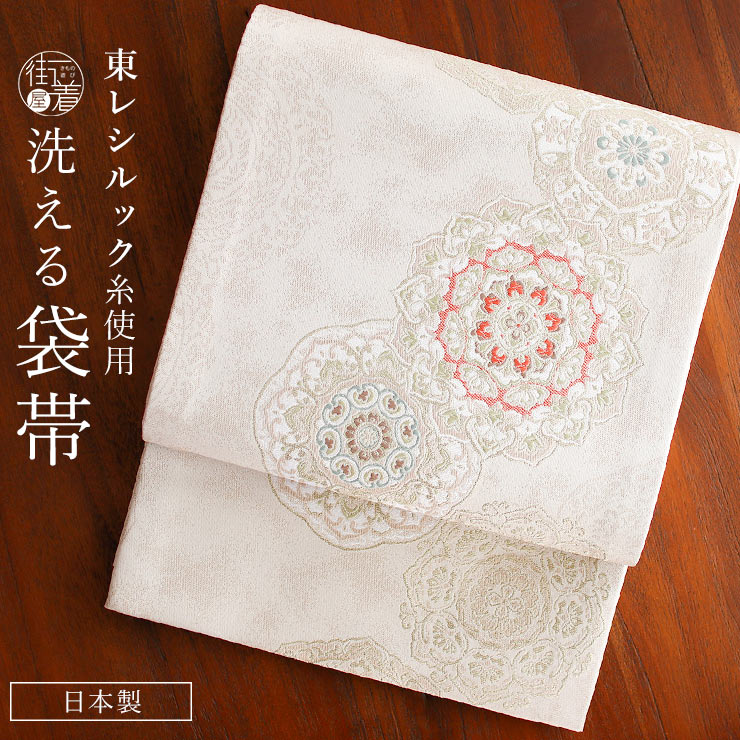 乐天商城 - ＼楽天マラソン開催中!／[東レシルック糸使用] 洗える 袋帯 織・華紋繋ぎ サンドベージュ 日本製 花紋 花柄 仕立て上がり 二重太鼓 六通柄 古典柄 礼装用 フォーマル 振袖 訪問着 付け下げ 江戸小紋 色無地 春 秋 冬 ポリエステル 洗える帯 成人式 結婚式 式典 女性 ym604s