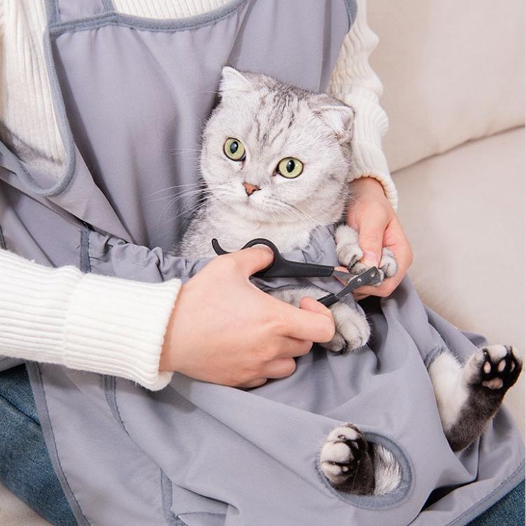 猫 小型犬 エプロン 猫 爪切り 抱っこ 抱っこ紐 ペット寝袋 猫 毛粘着防止 カンガ...