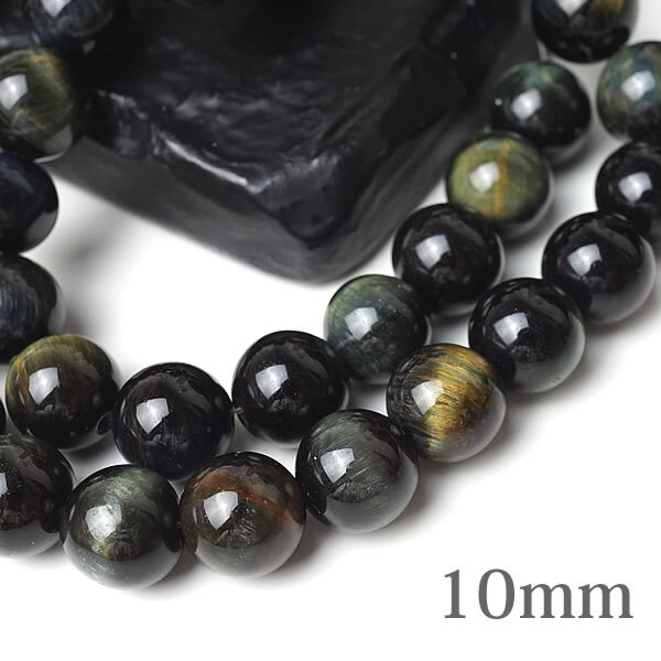 商品情報天然石グリーンタイガーアイ形状ラウンドビーズ(穴あき)粒サイズ約10mm（±0.5mm）通し穴サイズ約1mm前後注意事項※紐で通した連の状態からランダムに選んだ物をお届けさせて頂きます。※天然石の為、一粒ごとに色合いや模様が異なるものもございます。※天然石製品の特徴として天然由来の傷やくぼみ、内包物やクラック等が含まれることがあります。※サイズには±0.5mm程の細かな誤差が出る場合がございます。ビーズ石の製造上の仕様ですのでご了承ください。天然石製品について天然石製品の特徴として天然由来の傷やくぼみ、内包物やクラック等が含まれることがあります。天然石の為、入荷時期等により色合いやサイズに個体差が生じる場合がございます。天然由来のイメージ違い等による返品・交換は出来かねますことをご了承ください。備考できる限り実際の商品の色合いに近づけておりますが、モニター環境の発色の具合により色合いが多少異なることがございます。【20粒/バラ売り】グリーンタイガーアイ(天然色) 10mm 虎目石 猫目石 穴あきビーズ ばら売り 粒売り 天然石 パワーストーン 手作り アクセサリー ハンドメイド ブレスレット ペンダント ピアス イヤリング製作 金運 財運 仕事運 天然グリーンタイガーアイ 青 緑 タイガーアイ 20玉 20珠 ビーズ バラ売り 粒売り 天然石 パワーストーン アクセサリー ハンドメイド ブレスレット パーツ 染色なしの天然グリーンタイガーアイになります。通常タイガーアイは染色を施しますのでとても貴重です。タイガーアイは直観力や決断力を養い、ビジネスや学業を成功へ導くサポートをしてくれる石として有名です。ビジネス運や金運を招く強いパワーは、新しく事業を始める人や新しいプロジェクトを始めようとする人に本来の実力を発揮させ、直観力、集中力、精神力を強化し、成功へと導きます。 2