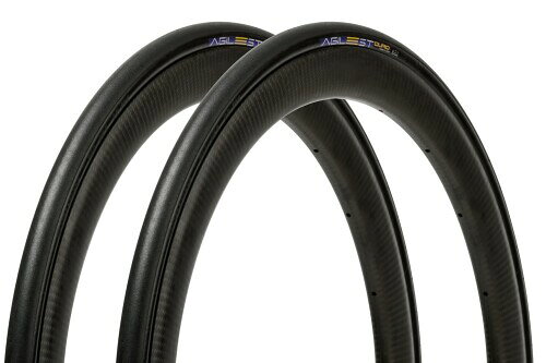 簡易包装 2本セット パナレーサー(Panaracer) アジリスト DURO 700×25C クリンチャー 黒 F725-AGD-B-2P サイズ:700×25C (25-622) / 重量:230g (1本あたり) 【耐パンク性】耐パンクベルトとアウターシールドを備え、耐サイドカット、耐貫通パンク性能を強化。パンク要因の多い荒れた路面や、パンクを避けたいロングライドなどで威力を発揮する超強化レーシングタイヤ。 【3Dケーシング構造】2層の耐パンク層でタイヤ全体を強化接着し、剛性感としなやかさを両立。 【ZSG AGILE Compound】レース・トレーニングからロングライドまで対応する性能を誇るトレッドコンパウンドを採用。 仕様:クリンチャー / ビード:フォールディング / 日本製 ※特別版2本セットはパッケージなしの簡易包装です。 【耐パンク性】耐パンクベルトとアウターシールドを備え、耐サイドカット、耐貫通パンク性能を強化。パンク要因の多い荒れた路面や、パンクを避けたいロングライドなどで威力を発揮する超強化レーシングタイヤ。 【3Dケーシング構造】2層の耐パンク層でタイヤ全体を強化接着し、剛性感としなやかさを両立。 【ZSG AGILE Compound】レース ■トレーニングからロングライドまで対応する性能を誇るトレッドコンパウンドを採用。 仕様:クリンチャー / ビード:フォールディング / 日本製 ※特別版2本セットはパッケージなしの簡易包装です。 商品コード20081199741商品名簡易包装 2本セット パナレーサー(Panaracer) アジリスト DURO 700&times;25C クリンチャー 黒 F725-AGD-B-2P型番F725-AGD-B-2Pサイズ700&times;25Cカラーブラック※他モールでも併売しているため、タイミングによって在庫切れの可能性がございます。その際は、別途ご連絡させていただきます。※他モールでも併売しているため、タイミングによって在庫切れの可能性がございます。その際は、別途ご連絡させていただきます。