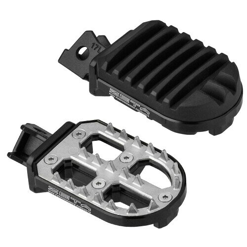 ジータレーシング(ZETA RACING) V-STROM250SX/800DE/1050/1050XT/1050DE アドベンチャーフットペグ ブラック 林道 ロングツーリング D8319 前後幅60mmのワイドな踏面は、スタンディング時の安定感を飛躍的に向上させる。 ワイドなゴムカバーは車体からの振動を吸収し、ロングツーリングでライダーへの疲労を大幅に軽減。また、適度なグリップによりスムーズなステップワークを可能とし、靴底への攻撃性も低い。 ステンレスブレードは靴底への食いつきがよく、泥やウエットコンディションでも滑りにくい。 足の裏に感じるグリップ感は、ボディアクションの大きいオフロード走行で真価を発揮する。 ステンレス製の歯(ブレード)は錆びにくく耐摩耗性にも優れる。 ツーリングスタイルやライディングポジションに合わせて、ステップの位置を前後5mm調節可能。 ※この商品はレースには対応しておりません。構造上、破損の恐れがございますので、レースでのご利用はお控えください。 ジータレーシング(ZETA RACING)ブランドは、株式会社ダートフリークが企画、設計をしているジャパンプランニング製品です。 適合車種 SUZUKI V-STROM1050 '20〜24, V-STROM1050XT '20〜21, V-STROM1050DE '23〜24, V-STROM250SX '23〜26, V-STROM800DE '23〜25 商品コード20081816007商品名ジータレーシング(ZETA RACING) V-STROM250SX/800DE/1050/1050XT/1050DE アドベンチャーフットペグ ブラック 林道 ロングツーリング D8319型番D8319カラーブラック※他モールでも併売しているため、タイミングによって在庫切れの可能性がございます。その際は、別途ご連絡させていただきます。※他モールでも併売しているため、タイミングによって在庫切れの可能性がございます。その際は、別途ご連絡させていただきます。