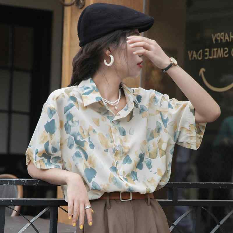 シャツ 花柄 フラワー ロング丈 とろみ シフォン ブラウス レディース 韓国系 カラフル くすみカラー バイカラー 襟付き 半袖 カジュアル ボタニカル 前開き ボタン キュート ラフ ルーズ 柔らかい 黄色 イエロー 青 ブルー こなれ感 ラフのサムネイル