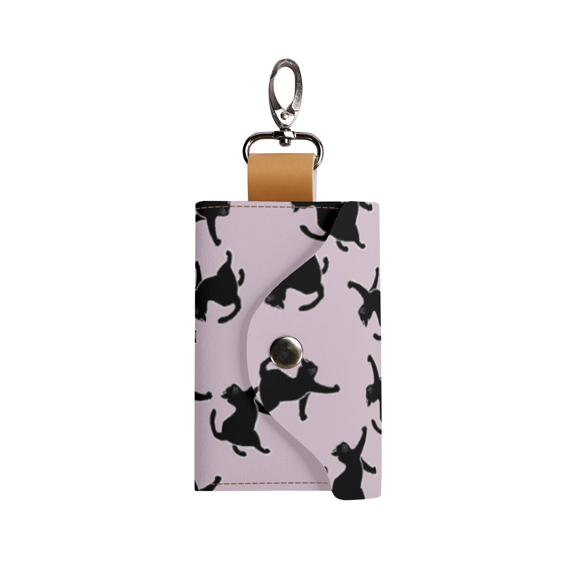 お得なクーポン 送料無料 ダンスネコヒゲノスケザエモン（クロぴんく）:ネコノヒゲアツメ(キーケース) キーケース ユニセックス アクセサリー 動物 ピンク 猫 ねこ nanaronnicoron ★★★