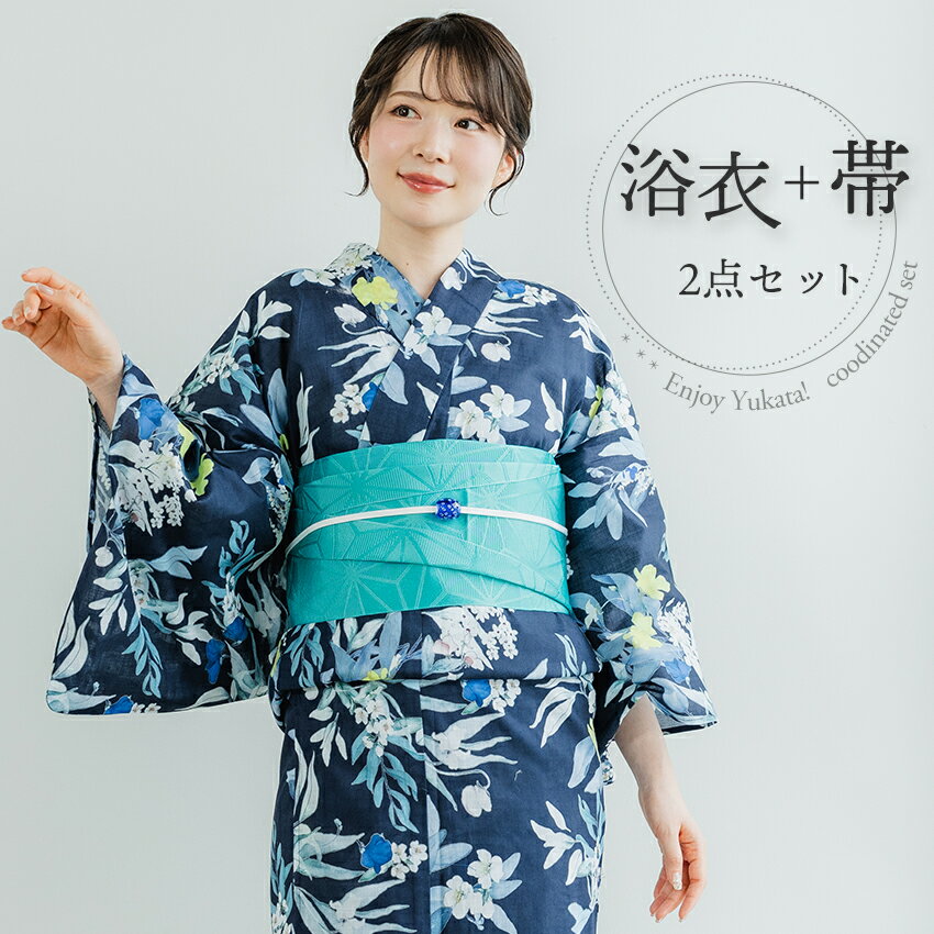 レディース浴衣2点セット 着物のプロがコーディネートした、 届けばすぐに着れる浴衣+帯のセットです。 綿100%の生地は通気性が良くさらっと快適。 ゆかた帯は柔らかく簡単に結べるものをご用意♪ ワンピースみたいに気軽に着られて、 ご家庭でもお洗濯できます。 二枚目、三枚目の洗い替えにもおススメです。 夏祭りや花火大会に 夏は浴衣でお洒落を楽しみましょう♪ 涼しく着られる薄手の生地なので、 必ず下に透け防止のスリップ等をお召しください。 ○夏向け和装インナーはこちら○ セット内容 お仕立て上り浴衣 半幅帯（浴衣帯） 　※モデル着用の帯飾りや下駄等は付属しません。ご注意ください。 【色柄】 涼し気な紺地に大人っぽい花が散りばめられ、落ち着きのある印象です。帯はこっくりしたミントグリーンの麻の葉柄を合わせ、柔らかな爽やかさのある雰囲気です。 　※浴衣の柄の出方は物により異なります。予めご了承ください。 　※モデル写真は撮影環境によりお色が明るく映る場合があります。 　　商品単体の画像はなるべく実際の色味に近づけておりますが、 　　モニター環境により誤差が生じますのでご了承ください。 サイズ・素材 【浴衣】　 素材：綿100% サイズ：フリーサイズ 身丈約163cm・袖丈約49cm・裄丈約68cm 適応身長：約153cm〜約165cm程度 【半幅帯（単衣帯）】 素材：ポリエステル100％ 長さ：360cm×幅：17cm おすすめ関連商品 他の色柄もございます♪ 　 　 　 浴衣を着るのに着付け小物をお持ちでない方は、 こちらも一緒にあると便利！ 浴衣着付け小物4点セット 他にも浴衣セットご用意しています。 浴衣セットはこちら 　　　