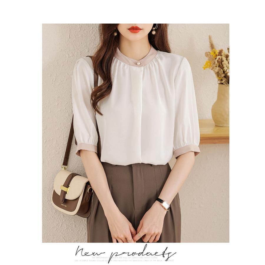 商品名:パールボタン配色ブラウス 5分袖 バイカラー シャツ プルオーバー 上品 キレイめ 大人可愛い お出かけ レディース 韓国ファッション 商品説明:バンドカラーパールボタンブラウス トップス ブラウス パールボタン バンドカラー サイズ:S M L XL サイズについての説明:S：着丈56cm 肩幅35cm 袖丈30cm バスト100cm/　M：着丈57cm 肩幅36cm 袖丈31cm バスト106cm/　L：着丈58cm 肩幅37cm 袖丈32cm バスト110cm/　XL：着丈59cm 肩幅38cm 袖丈33cm バスト116cm/　※サイズ表の実寸法は商品によって1-3cm程度の誤差がある場合がございます。