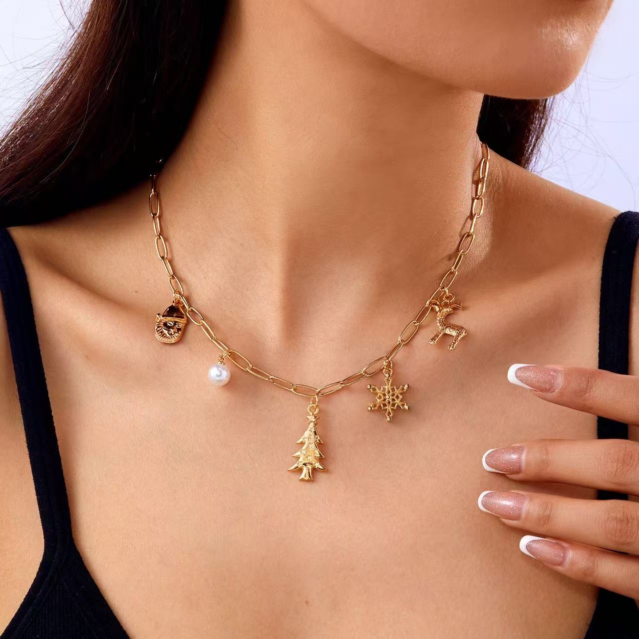 欧米のアイデア雪のクリスマスの新しいブレスレットの雪のサンタクロースの鈴の花輪プレゼントペンダント引張りブレスレット