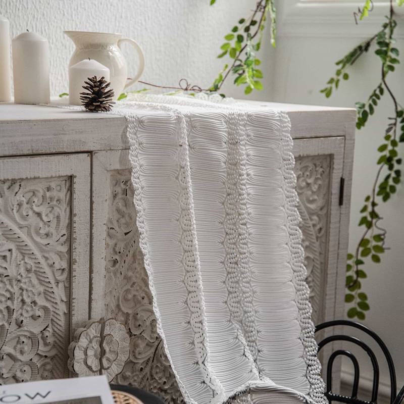 　　　 ◆◇◆売れている秘密◆◇◆ 【レースデザイン】繊細な刺繍を施した「レース テーブルランナー」は、お部屋に置くだけで優しい雰囲気を演出します。こちらの「テーブルセンター レース」は温かみのあるアイボリーカラーで、様々なインテリアに調和します。な「北欧風 テーブルランナー」が空間をパッと華やかに彩ります。 【大切な家具を保護】この美しい「食卓ランナー」は、お気に入りの家具を傷や埃から優しく守ります。耐久性に優れた「テーブルカバー」として活躍し、毎日の食事の時間をより豊かで心地よいものに変えてくれます。された「家具保護カバー」として、見た目と実用性の両方を叶えます。 【多用途なマルチカバー】ダイニングテーブルだけでなく、「コンソールテーブル ランナー」や玄関のシューズボックス、リビングの「チェストカバー」としても最適です。マルチに使える「テレビ台 マット」は、置くだけでお部屋のインテリア性が一段とアップし、心地よい暮らしをサポートします。 【簡単お手入れで清潔】手触りが柔らかく耐久性のある「レース テーブルクロス」は、丁寧な縫製で仕上げられており、長くご愛用いただけます。汚れても手軽にお手入れができる「おしゃれ テーブルランナー」なので、日常使いはもちろん、「丸洗い テーブルランナー」としていつでも清潔に保てます。 【特別なギフトにも】フェミニンで可愛い「姫系 テーブルランナー」は、アンティーク調の家具とも相性です。大切な方への引っ越し祝いや「新築祝い ギフト」としても大変喜ばれる「アンティーク風 テーブルマット」です。日々の暮らしにささやかな癒やしとときめきをお届けします。 　　　◆◇◆注意事項◆◇◆ご覧のモニターの環境、撮影環境により実物と色味が異なって見える場合がございます。湿った状態で他のものと擦り合わせると色が移る恐れがあります。濃色品の洗濯時は、白色、淡色と分けて洗ってください。説明 【レース テーブルランナー】繊細な透かし彫りデザインが美しいおしゃれ テーブルランナーです。温かみのあるオフホワイトカラーが、お部屋に優しい雰囲気を演出し、この北欧 テーブルランナーを置くだけでいつもの空間が優雅でされた印象へと生まれ変わります。 【大切な家具を守るテーブルセンター】このなテーブルセンターは、大切なダイニングテーブルやチェストを傷やホコリから優しく保護します。デザイン性と実用性を兼ね備えた食卓ランナーは、お気に入りのインテリアを長く美しく保ちたい方にぴったりのマルチカバーです。 【幅広く使えるおしゃれ テーブルランナー】ダイニングテーブルはもちろん、リビングのローテーブルや玄関のチェストの上など、多様な場所に調和するレース テーブルランナーです。特別な日のホームパーティーから日常のティータイムまで、毎日の暮らしに心地よく寄り添います。 【丁寧な縫製のレース テーブルランナー】職人技が光る丁寧な編み込みで仕上げられたテーブルセンターです。耐久性に優れた柔らかい素材を採用しており、汚れても手軽に手洗いができるため、いつでも清潔感をキープ。日常使いの食卓ランナーとして、長く愛用していただける仕上がりです。 【贈り物にも喜ばれるインテリア雑貨】されたフレンチカントリー調や姫系のインテリアによく馴染む、大人可愛い北欧 テーブルランナーです。新築祝いや結婚祝い、母の日などの特別なギフトとしても大変喜ばれます。大切な方へ、お部屋を彩るおしゃれ テーブルランナーを贈りませんか。