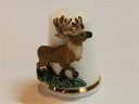 STERLING & CLASSIC Thimble 【トナカイ】reindeer ボーンチャイナの指ぬきに、 ハンドペイントで彩色されたピューター製のフィギュア。 とても美しいシンブルです。 サンタクロースのソリを引くので有名ですね。 イギリス　スターリングクラシック社製 ボーンチャイナ、ピューター サイズ：約23x24x32mm