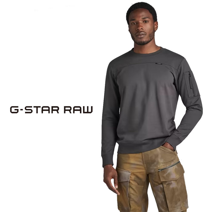 G-STAR RAW【ジースターロウ】　オランダ「アムステルダム」にて1989年に設立された、G-STAR RAW(ジースターロウ)。ジーンズ市場において、その革新的かつ最先端を行くスタイルで知られてきた。それまでのジーンズの領域を超え、何度も試行を繰り返し常に新しい商品を開発することで、世界中から多くの支持を集めている。ラフでピュア、素材そのものを生かすというブランドの明確な方針によって、G-STAR RAW(ジースターロウ)は他とは違う独自のスタイルを築き上げている。【ブランド名/商品名】ジースター ロウ G-STAR RAW トレーナー スウェット メンズ TWEETER SLEEVE POCKET D23514-D136【デザイン】ジースターから新作トレーナーが登場!!Sleeve Pocket Tweeterは、ストレートフィットの薄手のトップス。片方の袖にジッパーポケットがあしらわれています。袖口にリブを配したロングスリーブスタイル。フロントの横シームにG-Star RAWのラベルが控えめに付いています。【モデル】身長175cm 76kg Mサイズを着用【素材】綿100%【品番】D23514■G-STAR RAW（ジースターロウ）全アイテム一覧へGO