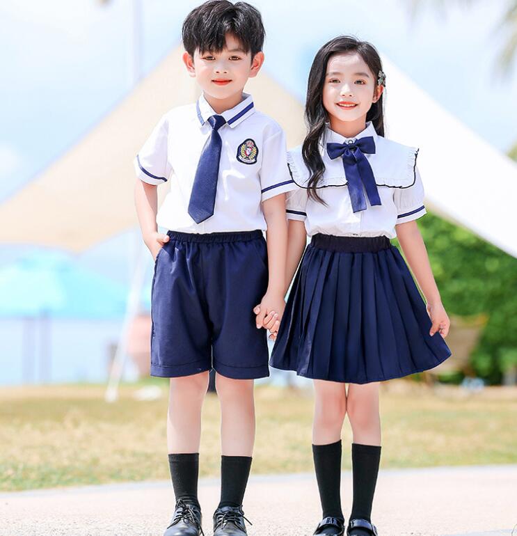 樂天商城 - 子供幼稚園制服 学園風女の子男の子舞台演出服　白 ベージュ フリル襟 夏普段着 ネクタイ シャツ スカート ショートパンツ チアダンス クラス服 中小生制服男女兼用ダンス衣装　チアガール　コスチューム　新作　発表会舞台演出服　卒業式　リボン付き バッジ付き100-180cm