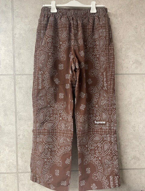 Rakuten - 2026SS/Supreme/シュプリーム/Reflective Bandana Track Pant/リフレクティブ バンダナ トラックパンツ/ナイロンパンツ/ペイズリー/Brown/ブラウン/茶色/サイズM (ゆったりめ)/メンズ