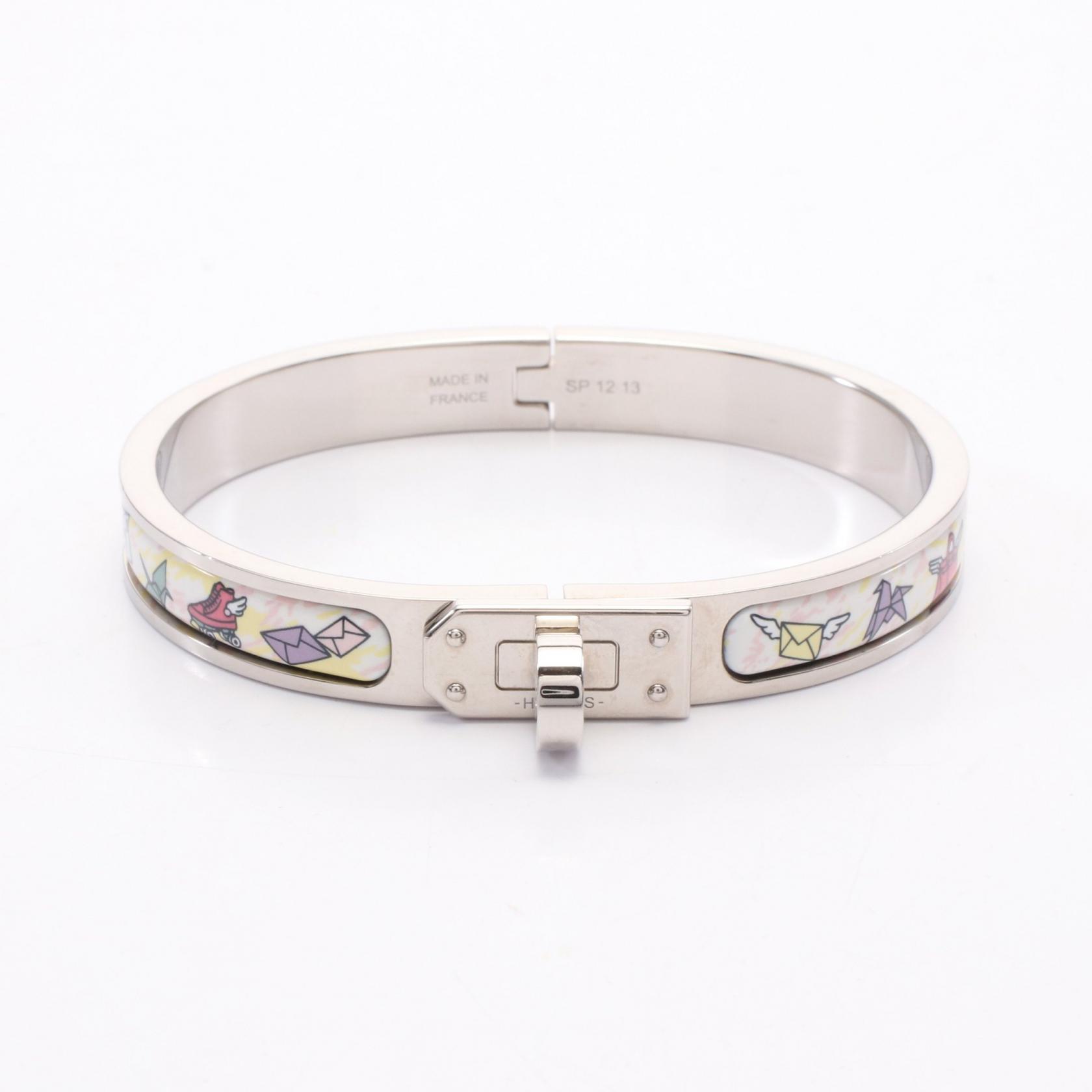 【3千円OFFクーポン対象】エルメス HERMES ミニクリック ケリー バングル アクセサリー ステンレススチール エナメル レディース シルバー系 / ホワイト系 / マルチカラー 【中古】のサムネイル