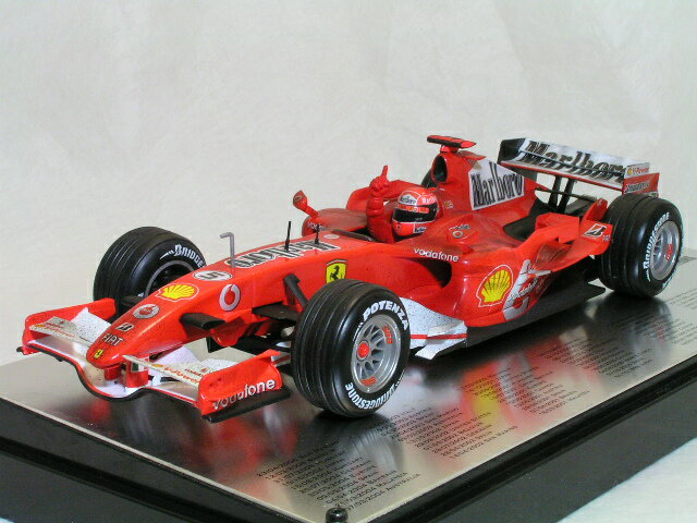 ホット ホィール ミニカー 1/18 スケールフェラーリ 248 F1ミハイル・シューマッハポールポジション 66回記念モデルフィニッシュライン バージョンのサムネイル