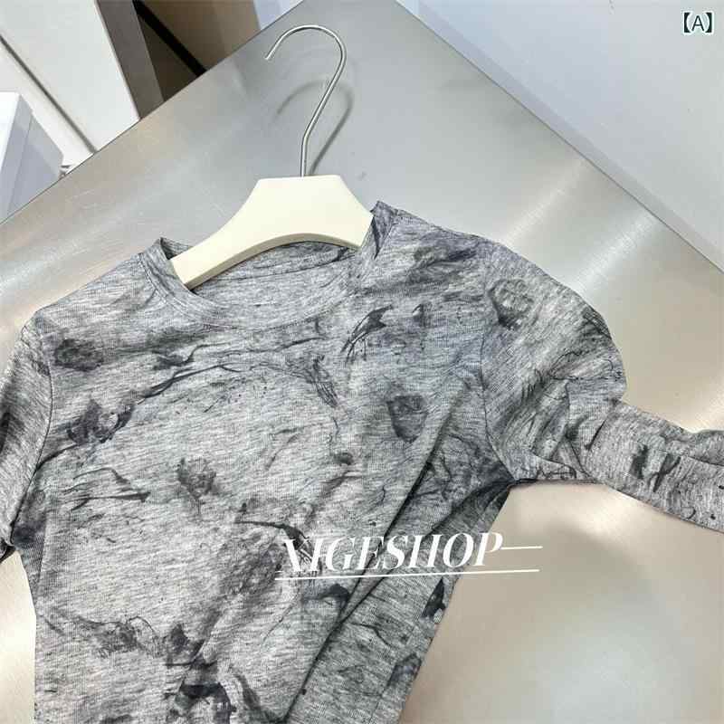 ・カテゴリ: Tシャツ・スタイル: 甜美・主な素材: ポリエステル95%以上・柄: 幾何模様・ネックライン: クルーネック・袖丈: 長袖・プリント加工: タイダイ・フィット: スリムフィット・着丈: 普通(50cm<着丈≤65cm)・袖型: スタンダード・カラー展開: 花グレー.花杏色・サイズ展開: M（42.5-50kg）.L（50-57.5kg）・柔軟性: 中程度
