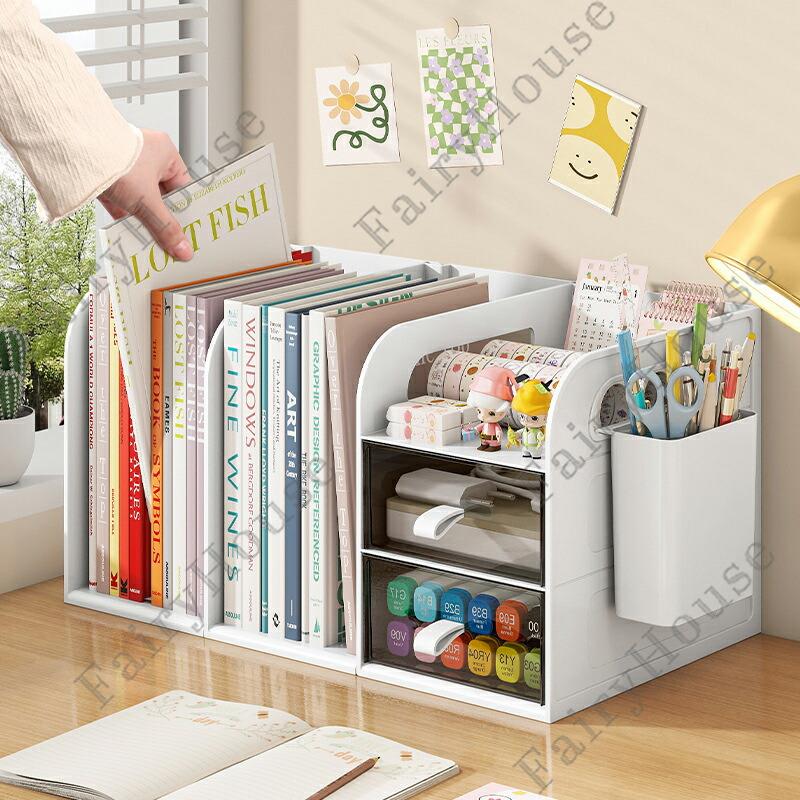※商品情報 カラー:ピンク、ブルー、ブラック、ホワイト 材質：ABS 内長サイズ: Aタイプ約24.8*20.7*18.9cm、Bタイプ約36*20.7*18.9cm、Cタイプ約47.5*20.7*18.9cm(手作業で測定する場合は、1〜3 cmの誤差を許容してください。実物を基準にしてください~) 大容量＆ハイスタンド設計で抜群の整理力ブックスタンド付きで収納力アップ。最大20×36cmの収納スペースと18.9cmのハイスタンド設計により、書類やノートもきれいに立てて収納。滑り止めライン付きで安定感も抜群です。 大きめ引き出しで隠す収納2つの引き出しは約6×20.7cmの広さでたっぷり容量。深さも十分あり、文房具や小物をまとめて収納可能。持ちやすい形状でスムーズに引き出せます。 フレキシブルな台面スペース引き出しの上には約12.7×20.7cmのオープンスペース付き。よく使うアイテムを置くのに便利で、囲い付きだから物が落ちにくく安心です。 取り外し可能なペン立て左右の付け替えや背面への取り付けが可能。使う場所や用途に合わせて自由にレイアウトできます。 安定感のある滑り止め設計底部に4つの滑り止めを配置ししっかり安定。耐荷重10kgの高品質ABS素材で丈夫で長持ち。 工具不要！かんたん組み立てパーツを合わせて差し込み、4つのロックを押し込むだけで完成。誰でも簡単に組み立てられます。 ※ご購入頂前にかならずご確認下さいませ。 ※商品ページに記載のサイズと商品タグに記載のサイズは、採寸方法の違い（ヌード寸法・製品寸法）により表記が異なる場合がございますので予めご了承下さい。 ※お使いのスマホの画面やパソコンのディスプレイにより、実物とは色合いや色の濃淡が異なって見える場合がございますのでご留意くださいませ。※商品情報 カラー:ピンク、ブルー、ブラック、ホワイト 材質：ABS 内長サイズ: Aタイプ約24.8*20.7*18.9cm、Bタイプ約36*20.7*18.9cm、Cタイプ約47.5*20.7*18.9cm(手作業で測定する場合は、1〜3 cmの誤差を許容してください。実物を基準にしてください~) 大容量＆ハイスタンド設計で抜群の整理力ブックスタンド付きで収納力アップ。最大20×36cmの収納スペースと18.9cmのハイスタンド設計により、書類やノートもきれいに立てて収納。滑り止めライン付きで安定感も抜群です。 大きめ引き出しで隠す収納2つの引き出しは約6×20.7cmの広さでたっぷり容量。深さも十分あり、文房具や小物をまとめて収納可能。持ちやすい形状でスムーズに引き出せます。 フレキシブルな台面スペース引き出しの上には約12.7×20.7cmのオープンスペース付き。よく使うアイテムを置くのに便利で、囲い付きだから物が落ちにくく安心です。 取り外し可能なペン立て左右の付け替えや背面への取り付けが可能。使う場所や用途に合わせて自由にレイアウトできます。 安定感のある滑り止め設計底部に4つの滑り止めを配置ししっかり安定。耐荷重10kgの高品質ABS素材で丈夫で長持ち。 工具不要！かんたん組み立てパーツを合わせて差し込み、4つのロックを押し込むだけで完成。誰でも簡単に組み立てられます。 ※ご購入頂前にかならずご確認下さいませ。 ※商品ページに記載のサイズと商品タグに記載のサイズは、採寸方法の違い（ヌード寸法・製品寸法）により表記が異なる場合がございますので予めご了承下さい。 ※お使いのスマホの画面やパソコンのディスプレイにより、実物とは色合いや色の濃淡が異なって見える場合がございますのでご留意くださいませ。