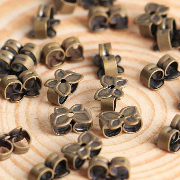 バタフライキャッチ(アンティークゴールド) 1個販売 ピアスパーツ バックストッパー アンティークゴールド 金具 部品 材料 DIY 蝶々 チョウ ちょう 可愛...