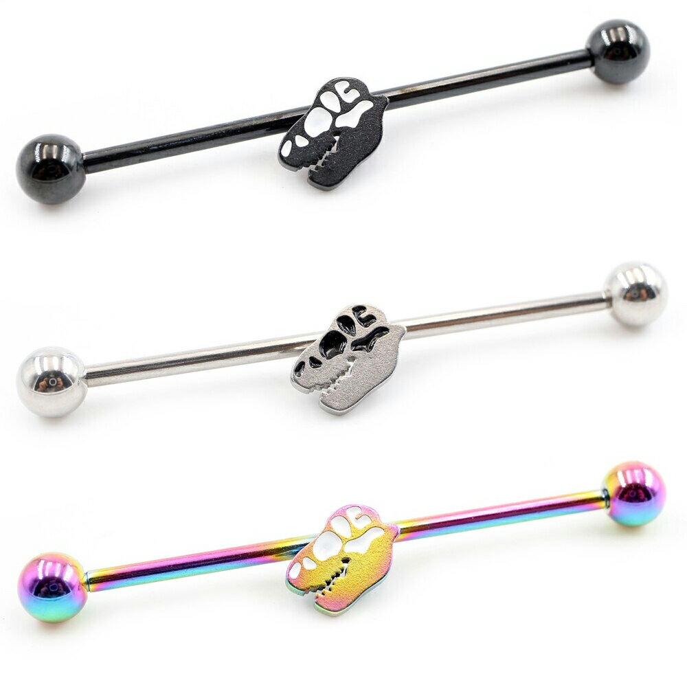 黒色ブラックカラー、虹色レインボーマルチカラー、銀色シルバーカラーの14ゲージの長いロングバーベルに恐竜の化石のモチーフをセットしたインダストリアル用ボディピアス。怪獣のデザインがメガバーベルの上で存在感をアピールするストレートバーベル型ボ...