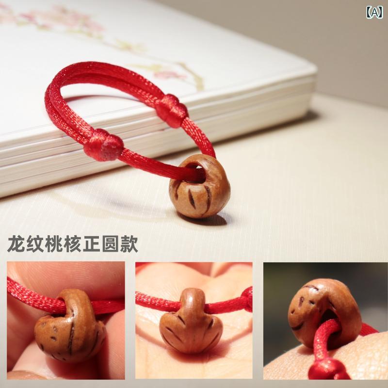 　おもちゃ　ホビー 野生 桃の 核 赤 ロープ ブレスレット 調節可能 幼児と 子供の 赤ちゃんの 身体 保..