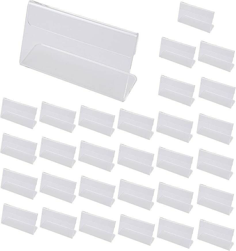バリエーションコード : 2b4rs1ryjk商品コード2b4rs1wpr9商品名ポップ スタンド L字 30枚 セット 7x4cm 値札 プライス カード 立て アクリル 横置きブランドGTM Smithサイズ等7x4cm (30個セット)・雑貨や小物を取り扱うお店の棚や時計やジュエリーなどを扱うショップのガラスケース内に飾る商品のプライスカード・ネームカード立てとしてお使い頂ける、ミニサイズのアクリル製L字型ポップスタンドセットです。・透明度の高いアクリルを使用しており、表面にはキズ付き防止のために半透明のプラスチックフィルムを取り付けております。ご使用の際には剥がしてお使いください。・小さな商品の陳列をしたい時にもお使い頂けるサイズなので、化粧品や小物やアクセサリーなどの値札立てとしてや、ディスプレイ用の商品のポップスタンドとしてご使用ください。・展示する商品の名前や価格も見やすいシンプルなデザインで、持ち運びも出来る軽く扱いやすいPOPスタンドです。＊保護フィルムを剥がした際に湿気などによる汚れがついていた場合は、メガネ拭きなどで拭いていただけばきれいな状態でお使い頂けます。・［セット内容］ 30個セット［材質］：アクリル［サイズ］ 縦：約4cm 横：約7cm 厚み：約1.5cm※ 他ネットショップでも併売しているため、ご注文後に在庫切れとなる場合があります。予めご了承ください。※ 品薄または希少等の理由により、参考価格よりも高い価格で販売されている場合があります。ご注文の際には必ず販売価格をご確認ください。※ 沖縄県、離島または一部地域の場合、別途送料の負担をお願いする場合があります。予めご了承ください。※ お使いのモニタにより写真の色が実際の商品の色と異なる場合や、イメージに差異が生じることがあります。予めご了承ください。※ 商品の詳細（カラー・数量・サイズ 等）については、ページ内の商品説明をご確認のうえ、ご注文ください。※ モバイル版・スマホ版ページでは、お使いの端末によっては一部の情報が表示されないことがあります。すべての記載情報をご確認するには、PC版ページをご覧ください。雑貨や小物を取り扱うお店の棚や時計やジュエリーなどを扱うショップのガラスケース内に飾る商品のプライスカード・ネームカード立てとしてお使い頂ける、ミニサイズのアクリル製L字型ポップスタンドセットです。小さな商品の陳列をしたい時にもお使い頂けるサイズなので、化粧品や小物やアクセサリーなどの値札立てとしてや、ディスプレイ用の商品のポップスタンドとしてご使用ください。透明度の高いアクリルを使用しており、表面にはキズ付き防止のために半透明のプラスチックフィルムを取り付けております。ご使用の際には剥がしてお使いください。展示する商品の名前や金額も見やすいシンプルなデザインで、持ち運びも出来る軽く扱いやすいPOPスタンドです。結婚式の席札としてもお使い頂けますので、ご利用いただけるシーンは多岐に渡ります。［セット内容］30個セット［材質］：アクリル［サイズ］縦：約4cm横：約7cm厚み：約1.5cm＊保護フィルムを剥がした際に湿気などによる汚れがついていた場合は、メガネ拭きなどで拭いていただけばきれいな状態でお使い頂けます。