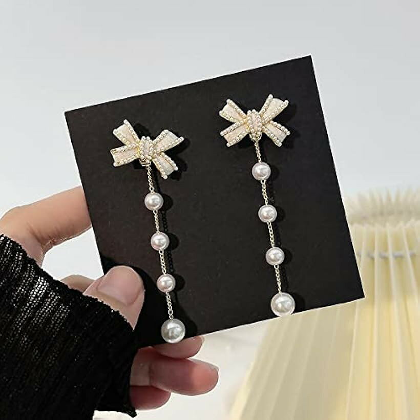 エムラインストアのピアス リボン 結婚式 お呼ばれ パーティー レディース 両耳用2つ入り 人気 可愛い トレンド (ホワイト)｜アングル3