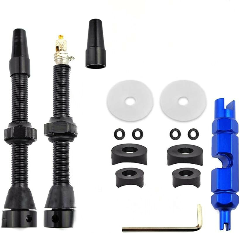バリエーションコード : 2b9w819slp商品コード2b9w81wokk商品名morytrade チューブレス用バルブセット コア回し付き チューブレスレディ 4穴ブランドMORY TRADEカラー黒 60mm 2本セット バルブコアツール付サイズ等標準チューブレス用ホイールのバルブセットです。前後用の2本入りです。ロードバイク・MTBバイクで一般的なフレンチバルブです。タイヤ側のバルブ根本部分は通常の穴に加えサイドに4穴があいており、タイヤインサートを入れた場合にシーラントが詰まりにくいバルブです。バルブ長さ60mmはリムハイト40mm 50mmに最適なサイズです。バルブ長80mmはリムハイト65mm程度のホイールに最適なサイズです。バルブコア回し入りセットの場合、延長バルブに加えバルブコアの脱着が容易にできるツールが付属します。バルブ根本部分は六角穴になっていて、バルブ装着時にバルブを固定できるので、しっかり装着することができ、エア漏れのリスクを低減します。※ 他ネットショップでも併売しているため、ご注文後に在庫切れとなる場合があります。予めご了承ください。※ 品薄または希少等の理由により、参考価格よりも高い価格で販売されている場合があります。ご注文の際には必ず販売価格をご確認ください。※ 沖縄県、離島または一部地域の場合、別途送料の負担をお願いする場合があります。予めご了承ください。※ お使いのモニタにより写真の色が実際の商品の色と異なる場合や、イメージに差異が生じることがあります。予めご了承ください。※ 商品の詳細（カラー・数量・サイズ 等）については、ページ内の商品説明をご確認のうえ、ご注文ください。※ モバイル版・スマホ版ページでは、お使いの端末によっては一部の情報が表示されないことがあります。すべての記載情報をご確認するには、PC版ページをご覧ください。