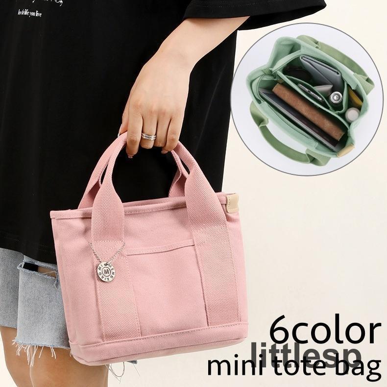 楽天モードナチュレ楽天市場店トートバッグ ミニトート ハンドバッグ 手提げ レディース 女性 鞄 カバン 仕分け 仕切り ポケット多数 チャーム付き シンプル カジュアル お洒落