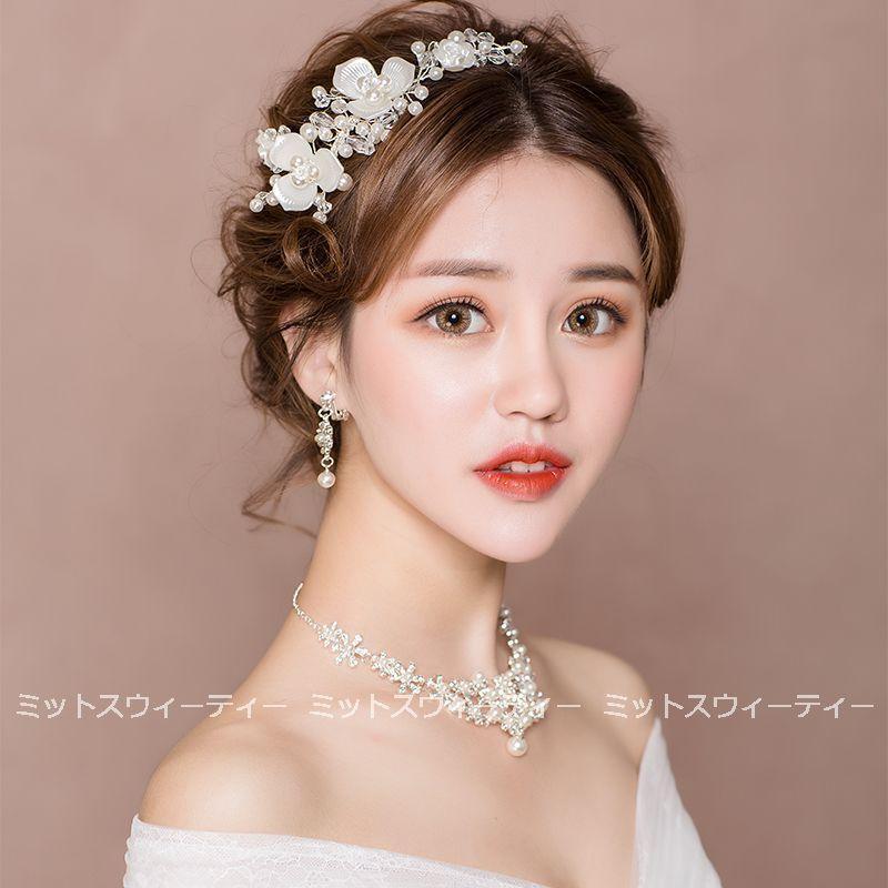 キーワード：花嫁 結婚式 二次会 ティアラ カチューシャ ヘッドドレス 髪飾り ヘアアクセサリー ウェディング小物 プリンセス 姫系 ジュエリー 安い ウェディング ウエディング ブライダル 発表会 演奏会 コンサート 音楽会 披露宴 パーティー 2次会 フォマール コンクール スタジオ ロケーション撮影 ガーデンウェディング レストランウェディン リゾート婚 フォトウェディング イベント ステージ 舞台 演出 海外挙式 前撮り 成人式 卒業式 セレモニー ☆ 商品内容：ヘッドドレス＋アメピン / ヘッドドレス＋ネックレス＋イヤリング＋アメピン / ヘッドドレス＋ネックレス＋ピアス＋アメピンゴージャスさと上品さを兼ね備えたデザイン☆ウェディングはもちろん、パーティーや発表会、舞台などでも活躍の1点です！成人式や卒業式、二次会、演奏会などにもピッタリなアクセサリーも多数取り揃えております。