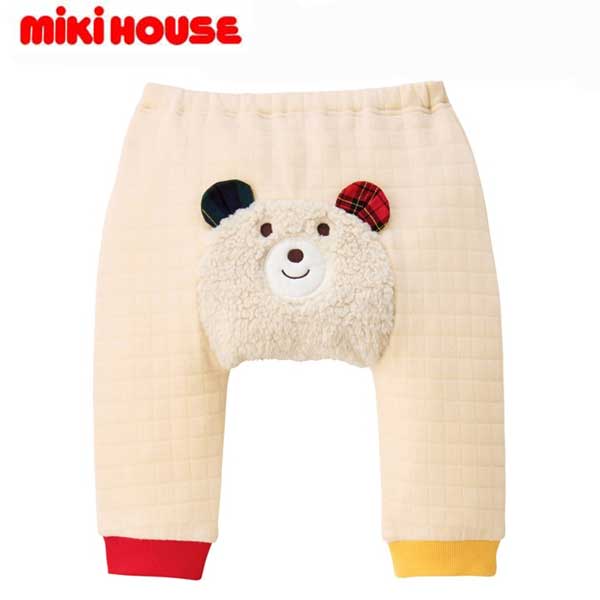 mikihouse(ミキハウス)　ホットビスケッツ　ベビーパンツ73-3206-498(70cm-80cm） ミキハウス ホットビスケッツのあったかベビーパンツ。 人気の顔ドンシリーズのあったか素材のベビーパンツです。 男の子も女の子も着やすいアイボリーのかわいらしいデザイン。 お尻のくまで後ろ姿までかわいく、お写真映えもバッチリ！ サイズ展開も70cmからで、セパレートデビューにもおすすめ◎ ふわりとした柔らかな肌触りのニットキルト素材は、 やや厚みがあり冬場に活躍する生地感です。 くまのお顔はふわふわのフリース素材でより季節感のある印象に。