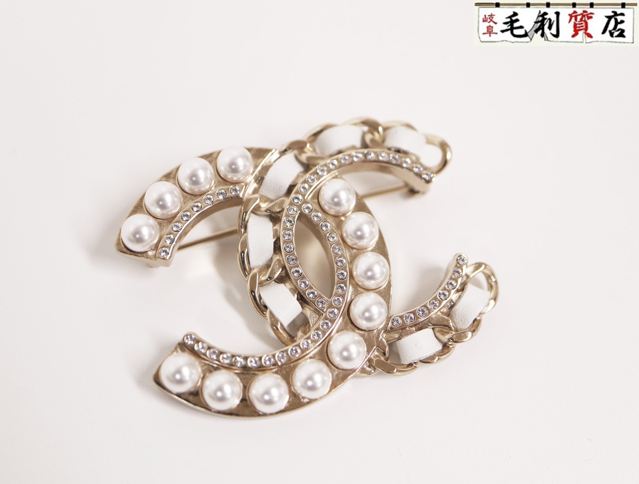 シャネル CHANEL B19C ココマーク ブローチ ラインストーン フェイクパール レザー シャンパンゴールド 極上美品 【中古】アクサセリーのサムネイル