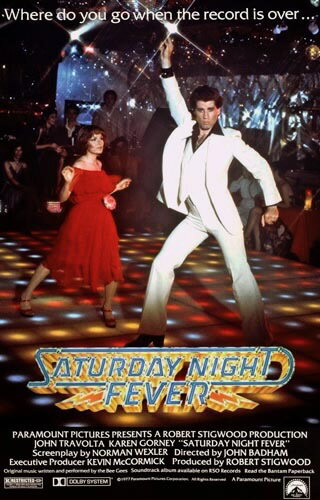 輸入 小型ポスター写真 米国版 ジョントラボルタ サタデーナイトフィーバー Saturday Night Fever John Travolta 約43.5x28cm.のサムネイル