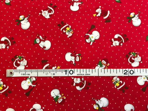 パッチワーク生地クリスマスプリント赤地に雪だるまとサンタさん